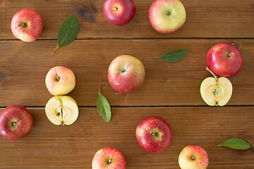 Image showing ripe red apples on wooden table