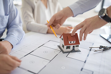 Image showing close up of architects discussing house project