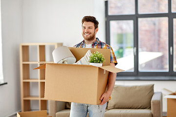 Image showing happy man with box moving to new home