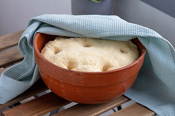 Image showing leavened dough in ceramic bowl