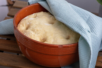 Image showing leavened dough in ceramic bowl