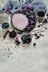 Image showing Sweet and tasty tart with fresh blueberries, blackberries and gr