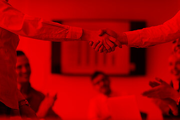 Image showing business womans handshake