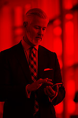 Image showing senior business man talk on mobile phone