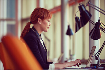 Image showing business woman working on computer at office