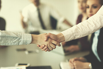 Image showing business womans handshake