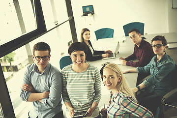 Image showing group of Business People Working With Tablet in startup office