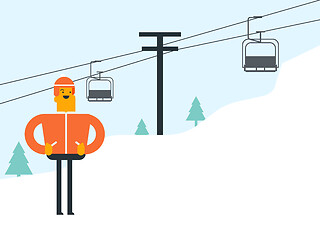 Image showing Caucasian white skier and cableway at ski resort.