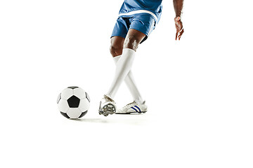 Image showing legs of soccer player close-up isolated on white