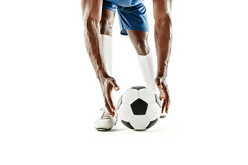 Image showing legs of soccer player close-up isolated on white