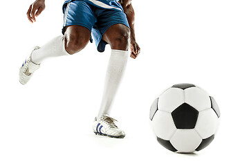 Image showing legs of soccer player close-up isolated on white