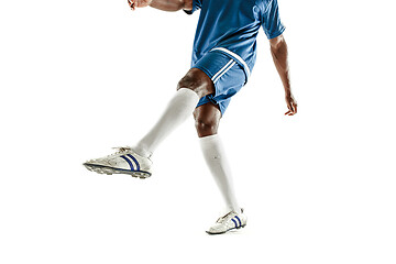 Image showing legs of soccer player close-up isolated on white