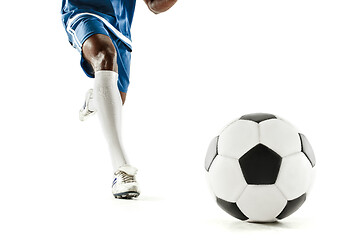 Image showing legs of soccer player close-up isolated on white