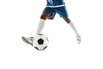 Image showing legs of soccer player close-up isolated on white