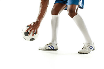 Image showing legs of soccer player close-up isolated on white