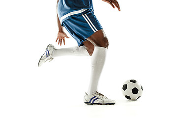 Image showing legs of soccer player close-up isolated on white