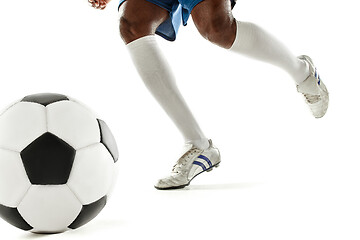 Image showing legs of soccer player close-up isolated on white