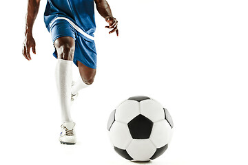 Image showing legs of soccer player close-up isolated on white