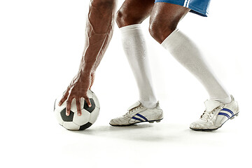 Image showing legs of soccer player close-up isolated on white