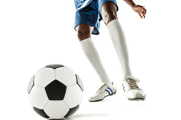 Image showing legs of soccer player close-up isolated on white