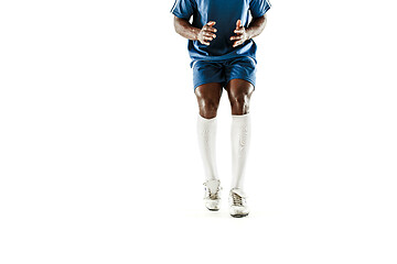 Image showing legs of soccer player close-up isolated on white