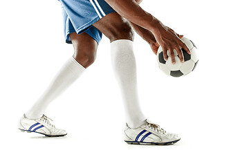 Image showing legs of soccer player close-up isolated on white