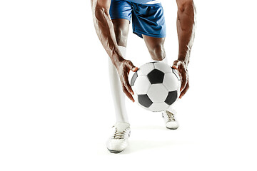 Image showing legs of soccer player close-up isolated on white