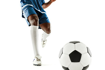 Image showing legs of soccer player close-up isolated on white