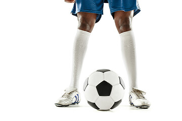 Image showing legs of soccer player close-up isolated on white