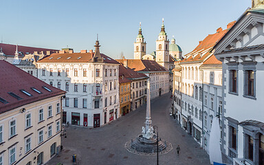 Image showing Panoramic aerial view of Town Square in Ljubljana, capital of Slovenia, at sunset. Empty streets of Slovenian capital during corona virus pandemic social distancing measures in 2020