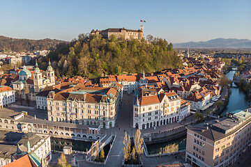 Image showing Aerial drone panoramic view of Ljubljana, capital of Slovenia in warm afternoon sun