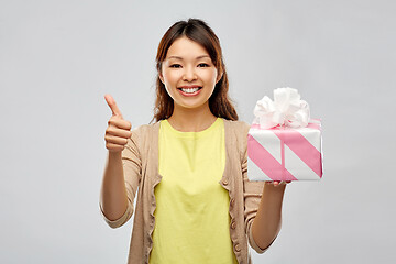 Image showing happy african american woman with birthday present