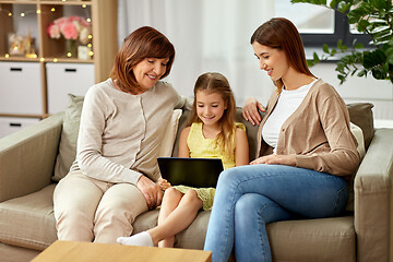 Image showing mother, daughter and grandmother with tablet pc