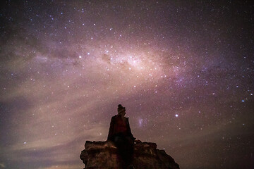 Image showing Sitting under the wondrous night sky how beautiful