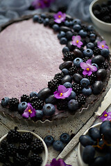 Image showing Sweet and tasty tart with fresh blueberries, blackberries and gr