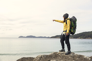 Image showing Woman pointing to the view