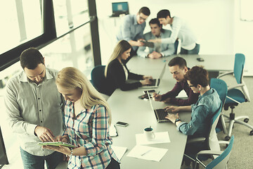 Image showing business People Working With Tablet in office