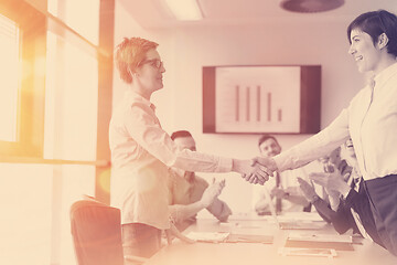 Image showing business womans handshake