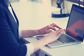 Image showing business woman working on computer at office