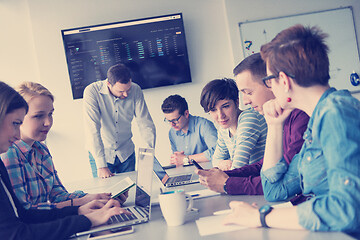 Image showing Group of young people meeting in startup office