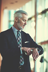 Image showing senior business man talk on mobile phone