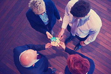 Image showing assembling jigsaw puzzle