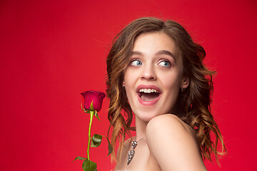 Image showing Beautiful young girl in studio with pearl jewelry - earrings, bracelet, necklace.