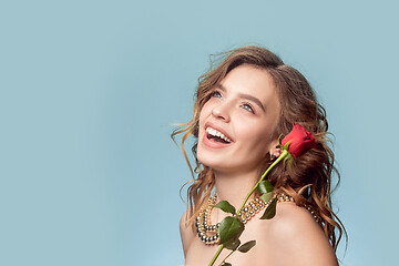 Image showing Beautiful young girl in studio with pearl jewelry - earrings, bracelet, necklace.