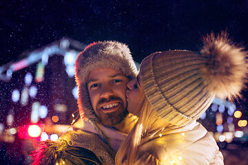 Image showing Adult couple hanging out in the city during Christmas time