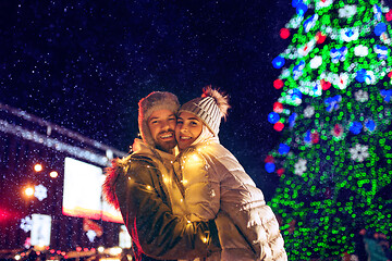 Image showing Adult couple hanging out in the city during Christmas time