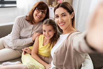 Image showing mother, daughter and grandmother taking selfie