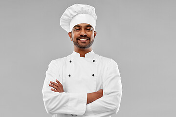 Image showing happy male indian chef in toque