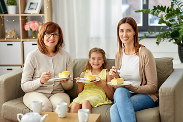 Image showing mother, daughter and grandmother eating cake