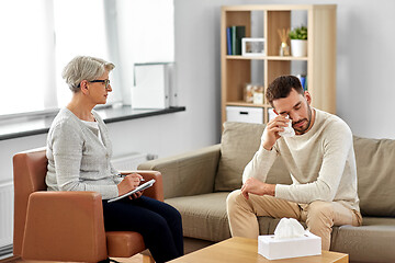 Image showing senior woman psychologist and crying man patient